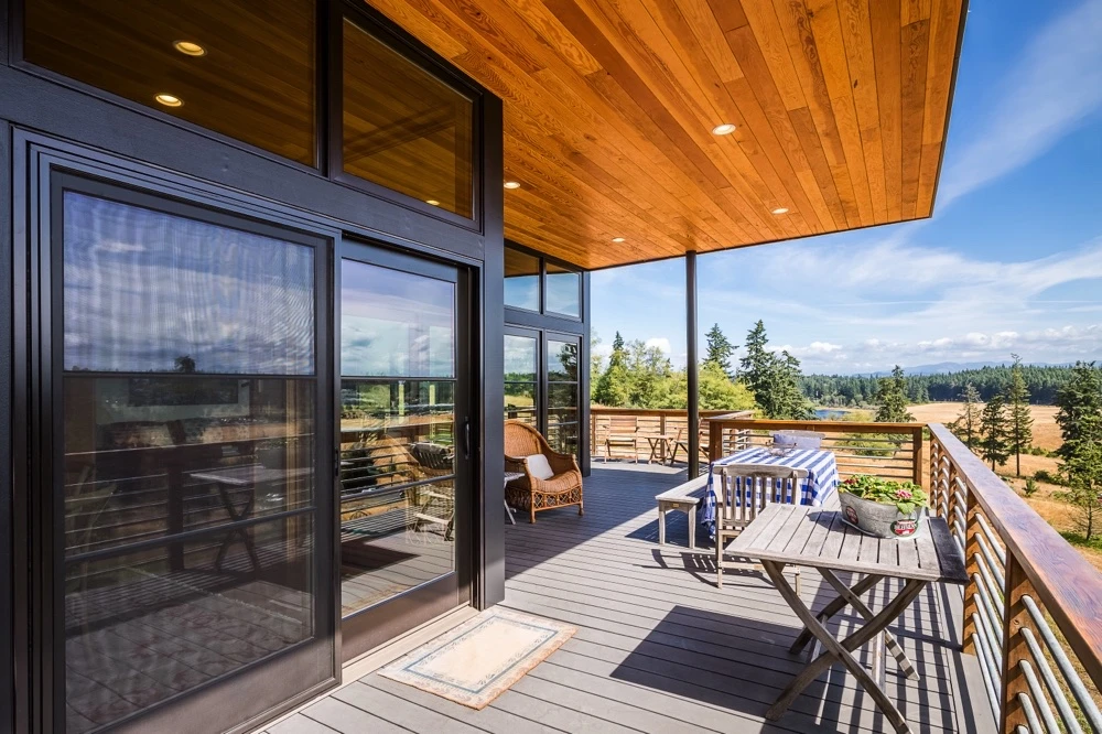 Method M2 wood-ceilinged deck opening to a view